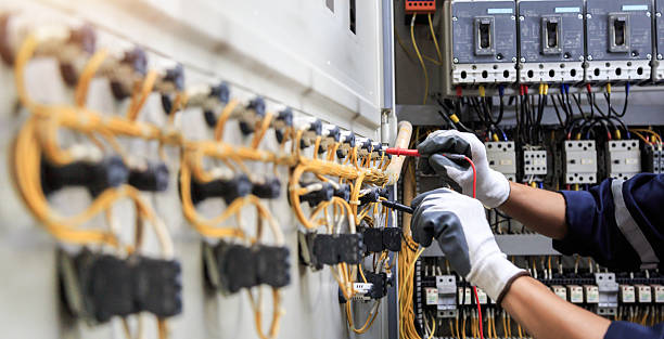 Professional Electrician technician working in Ferguson, MO